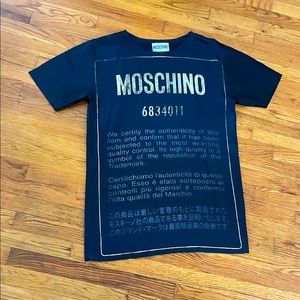 Authentic Moschino 6834011 dress. Oversized shirt style. Fits M or L.
